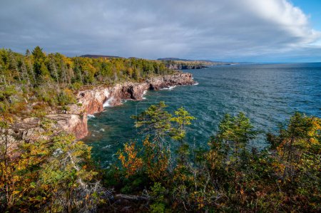 Photo for The rugged and wild shoreline of the North Shore of Lake Superior on an overcast autumn day. - Royalty Free Image
