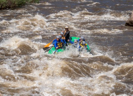 Photo for Truly adventure photograph of people taking on the rough water of the Arkansas River in spring of 2023 after lots of rain and snow melt made for some really exciting paddling. - Royalty Free Image