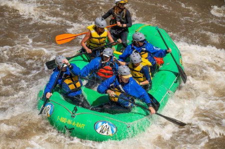 Photo for Truly adventure photograph of people taking on the rough water of the Arkansas River in spring of 2023 after lots of rain and snow melt made for some really exciting paddling. - Royalty Free Image