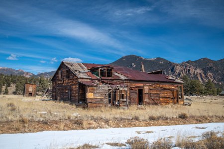 Photo for This old historic structure which may have been an old towns store is being weathered away in the Colorado mountains. - Royalty Free Image