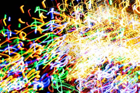 Photo for Psychedelic abstract long exposure motion colour lights. Light trails, leaks and glowing electricity. Music visualisation abstraction background. Christmas holiday festive lights. - Royalty Free Image