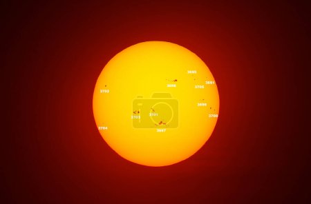 Solar Sun disk June 4, 2024 sunspots, with 11 active regions artistic concept. The famous active sunspot region 3697 (ex 3664)  Sunspots create coronal mass ejection (CME) seen as auroras on earth