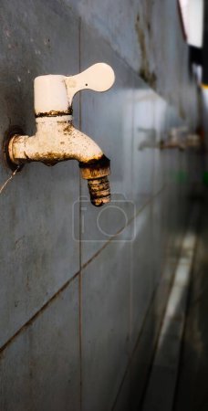 Photo for Water faucet that looks rusty and moldy - Royalty Free Image