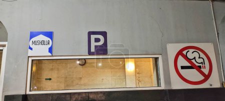 Photo for Several signs or symbols are posted on public facilities in the rest area. - Royalty Free Image