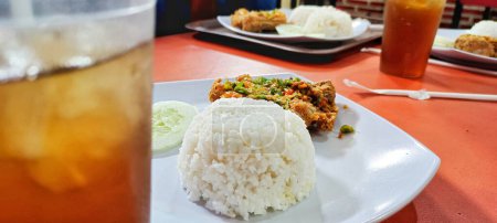 Photo for Ayam Geprek is one of Indonesian street foods that you must try, it tastes spicy and delicious. - Royalty Free Image