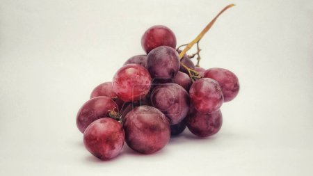 Photo for Red grapes is photographed with isolated on a white background - Royalty Free Image