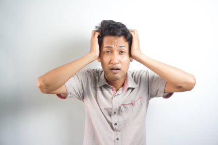 Photo for Exhausted man having a strong headache - Royalty Free Image