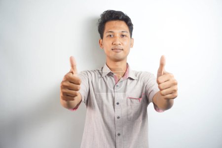 Photo for Happy man thumbs up sign full length portrait on white background - Royalty Free Image