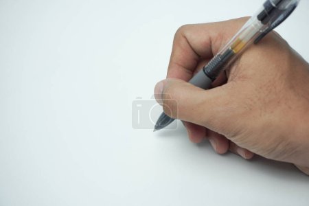 Photo for Cropped Hand Writing On White Background - Royalty Free Image