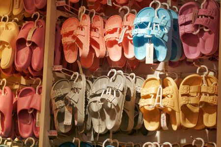 Photo for Balikpapan, 22 Oct 2023, colorful Flip Flops at Miniso variety store.  light and non-slippery miniso sandals in various colors - Royalty Free Image