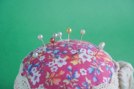 Needle point, stick to the foam needles. Dressmakers pins. (jarum pentul) It is made of stainless with a pointed end. Pins are usually used to hook between fabrics. 