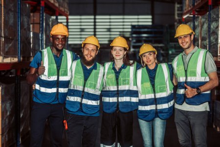 Photo for Multicultural warehouse staff creates logistical atmosphere that encourages empowerment, confidence. The collaborative and diverse team results in excellent performance and a strong sense of unity. - Royalty Free Image