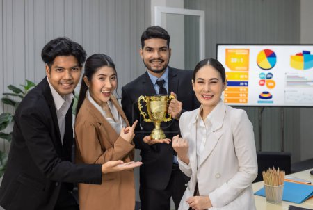 Photo for Asian agile business team's performance receives positive client feedback and meets expectations. Each member is excited and celebrates enthusiastically. The business team's milestone celebration. - Royalty Free Image