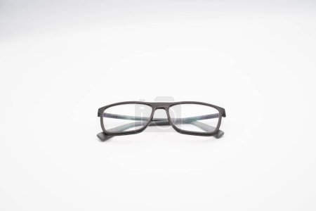 Photo for Black glasses with a thick rim photographed against a white background, during a photo shoot in January 2023 - Royalty Free Image