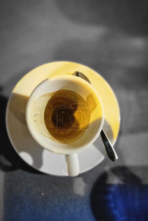 Photo for Cup of Italian black coffee with saucer ready to be drunk in a bar in Liguria - Royalty Free Image