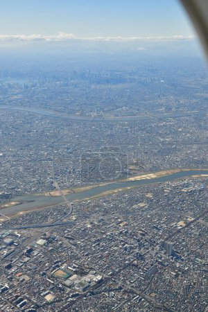 Tokyo Area from Airplane Window aerial photograph Jet Engine Wing. High quality photo