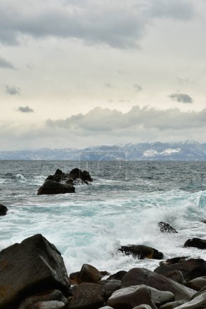 Coast of Hokkaido in winter japan clouds rough sea. High quality photo