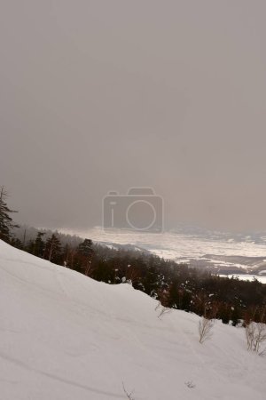 Photo for Snow landscape in hokkaido Japan bad weather coming in Clouds. High quality photo - Royalty Free Image