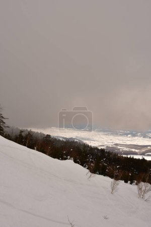 Photo for Snow landscape in hokkaido Japan bad weather coming in Clouds. High quality photo - Royalty Free Image