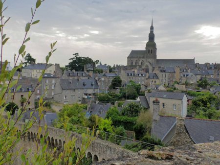 Photo for Dinan, France - August 2018 : Visit the beautiful city of Dinan in Brittany, through the fortifications and through the city - Royalty Free Image