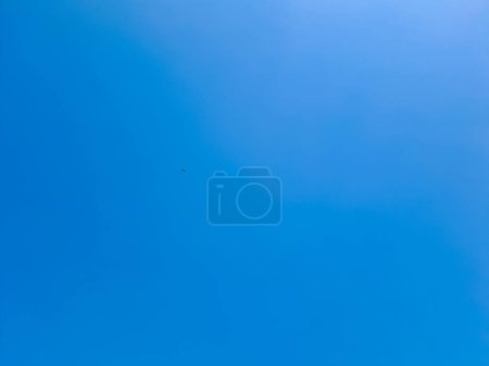 Photo for Clear blue sky, cloudless. Gradation of brightness sky in a daytime. Nature theme background - Royalty Free Image