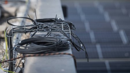 Foto de Solar panel power cables on a roof - Imagen libre de derechos