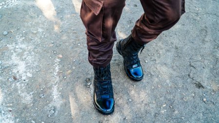Photo for Military boots. Trousers and shoes for security officers with a modern design - Royalty Free Image