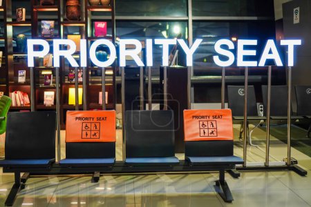 Photo for Cengkareng, Oktober 12, 2022: Priority seats at the Soekarno Hatta airport. Priority seats for persons with disabilities, pregnant women, nursing mothers, mothers with babies, or the elderly at the airport - Royalty Free Image