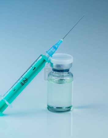 Photo for Syringe with needle, vial and pills with steroids. illegal doping in sport concept - Royalty Free Image
