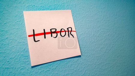 Photo for LIBOR (abbreviation for London Interbank Offered Rate) on a sticky note, crossed out with a red pen in IBOR transition to risk free rate SOFR - Royalty Free Image