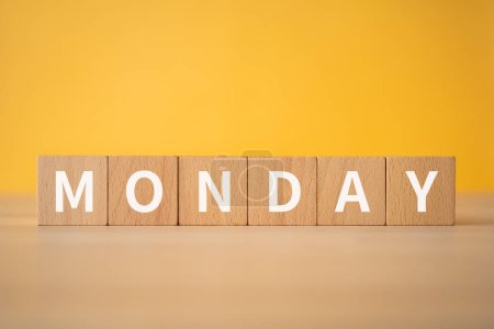 Wooden blocks with "MONDAY" text of concept.