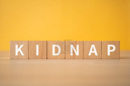 Photo for Wooden blocks with "KIDNAP" text of concept. - Royalty Free Image