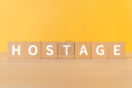 Photo for Wooden blocks with "HOSTAGE" text of concept. - Royalty Free Image