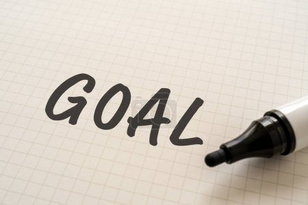 Photo for White paper written "GOAL" with a marker. - Royalty Free Image
