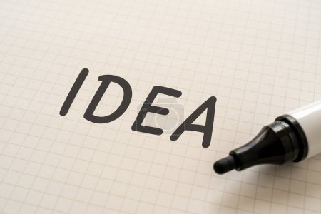 Photo for White paper written "IDEA" with markers. - Royalty Free Image