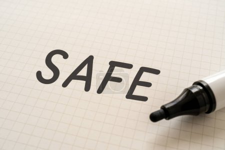 Photo for White paper written "SAFE" with markers - Royalty Free Image
