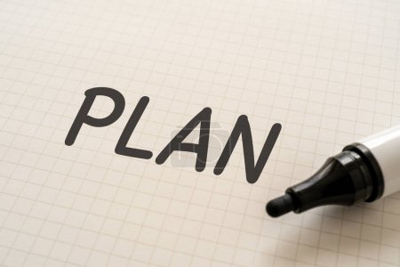 Photo for White paper written "PLAN" with markers - Royalty Free Image
