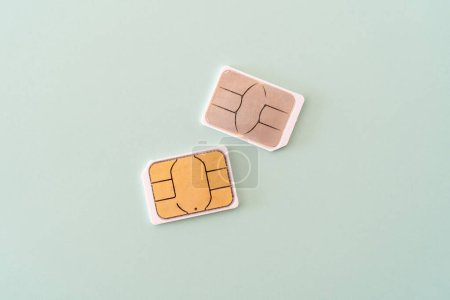 Photo for Sim cards on blue background. technology and internet concept. mobile and phone technology concept. - Royalty Free Image