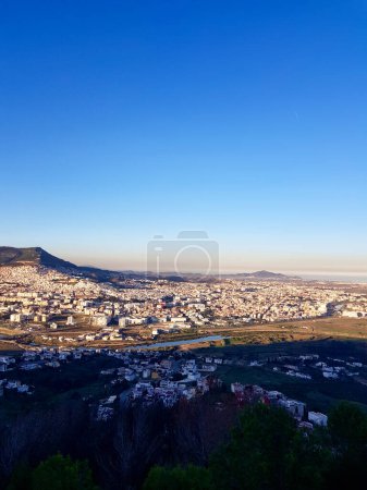 A bird's eye view of the city of Tetouan, spread your wings and fly above Tetouan, where Africa and Europe meet in cityscape that invites you to descend and immerse yourself in its captivating embrace