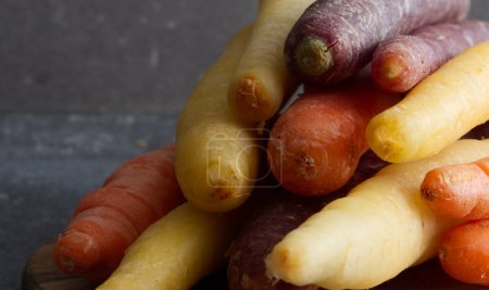 Photo for Rainbow carrot close-up, yellow, purple, orange. High quality photo - Royalty Free Image