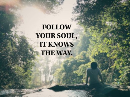 Motivational and inspirational wording. Follow your soul, it knows the way. Written on blurred vintage style background.