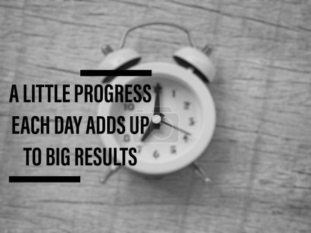 Photo for Motivational and inspirational quote - A little progress each day adds up to big results. With vintage styled background. - Royalty Free Image