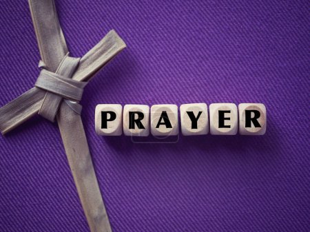 Photo for Christianity concept about Good Friday, Lent Season and Holy Week. PRAYER written on wooden blocks. With blurred purple background. - Royalty Free Image