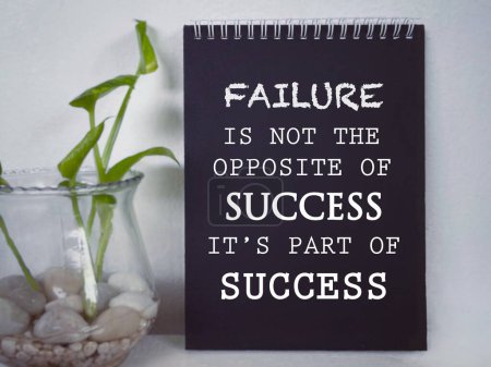 Photo for Motivational and inspirational wording. FAILURE IS NOT THE OPPOSITE OF SUCCESS. ITS PART OF SUCCESS written on a notepad. With blurred styled background. - Royalty Free Image