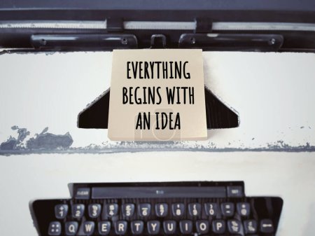 Photo for Motivational and inspirational wording. EVERYTHING BEGINS WITH AN IDEA written on blurred styled background. - Royalty Free Image