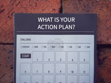 Photo for Management and motivational word. WHAT IS YOUR ACTION PLAN written on a book planner. With blurred styled background. - Royalty Free Image