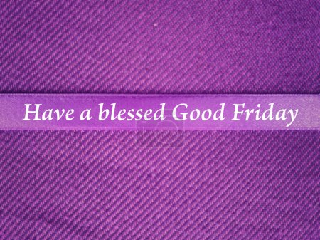 Christianity concept about Ash Wednesday, Good Friday, Lent Season and Holy Week. Have a blessed Good Friday written on a purple ribbon. With blurred style background.