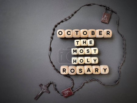 Photo for Christianity Concept - October The Most Holy Rosary text background. Stock photo. - Royalty Free Image