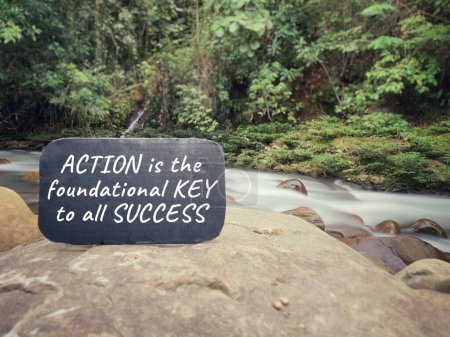 Photo for Inspirational motivational quote - Action is the foundational key to all success. - Royalty Free Image