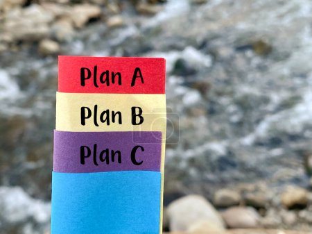 Photo for Inspirational Success Concept - Plan A plan B plan C on multiple color papers with nature background. Stock photo. - Royalty Free Image